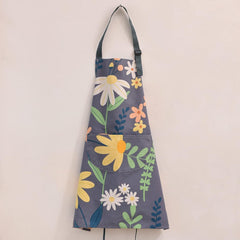 Adjustable neck strap and long waist ties on cotton chef apron