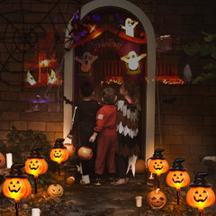 Solar panel and ground stake on pumpkin pathway light