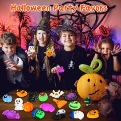 Assorted Halloween squishy toys including witches, spiders, zombies, and eyeballs