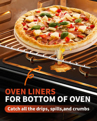 Black oven liner catching drips and spills on a baking rack