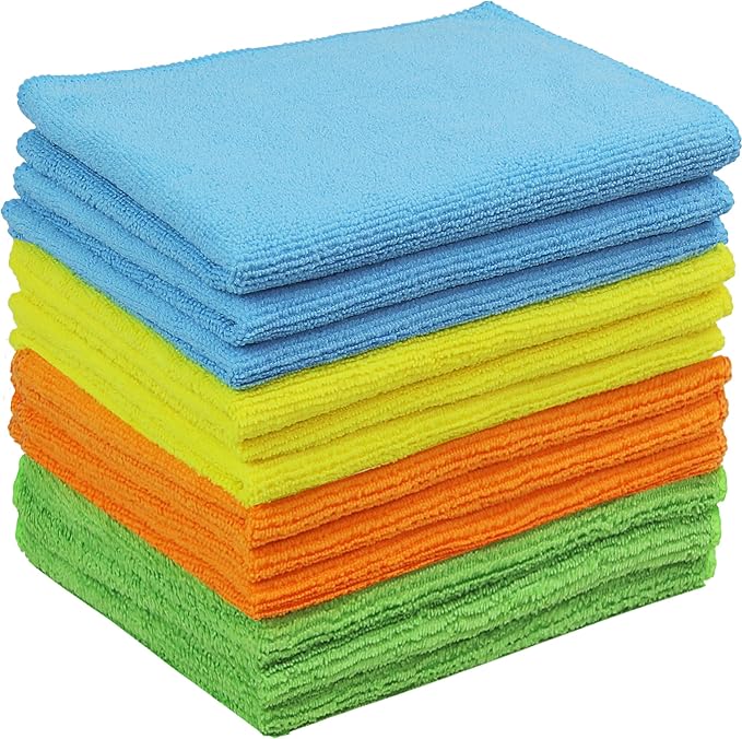 Stack of folded microfiber cleaning cloths in blue, green, yellow, and orange
