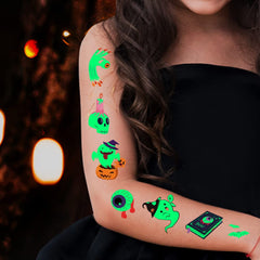 Temporary tattoos glowing in the dark showing skeleton design