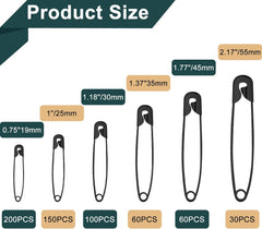 Black safety pins organized by size in clear storage box
