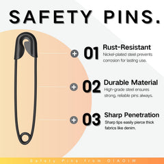 Black safety pins organized by size in storage box
