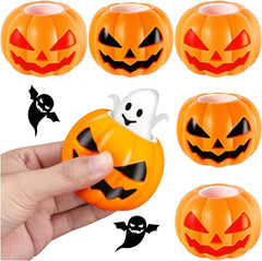 Six Halloween pumpkin silicone squeeze toys with ghost pop-up