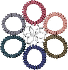 Spiral wrist keychain worn on wrist during workout