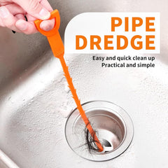 Barbed drain snake pulling hair and debris out of a bathroom sink drain