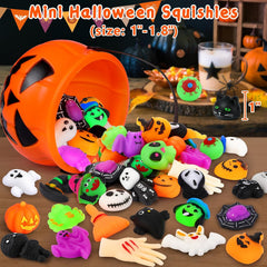 Close-up of mini ghost, pumpkin, and black cat mochi squishy toys