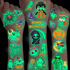 Glow-in-the-dark Halloween temporary tattoos with vampires, mummies, pumpkins, ghosts, and skeletons shown on arms